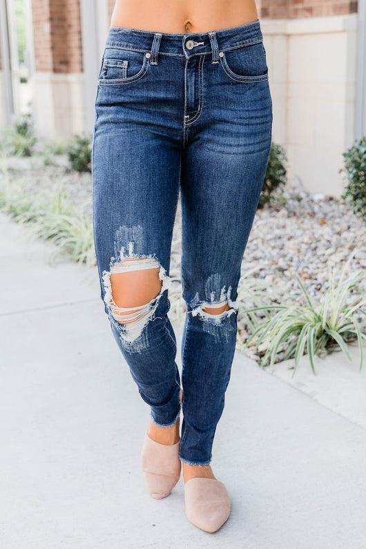 The Kallista Dark Wash Distressed Crop Jeans