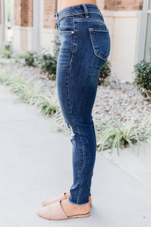 The Kallista Dark Wash Distressed Crop Jeans